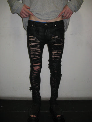 DISTRESSED SKINNY JEANS