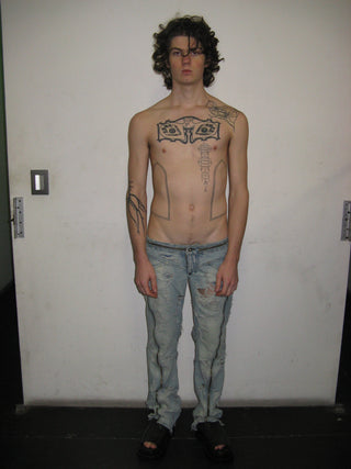 DISTRESSED ZIPPED BIKER JEANS