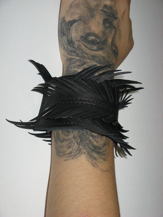 LEATHER FEATHER CUFFS