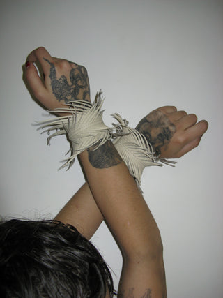 LEATHER FEATHER CUFFS