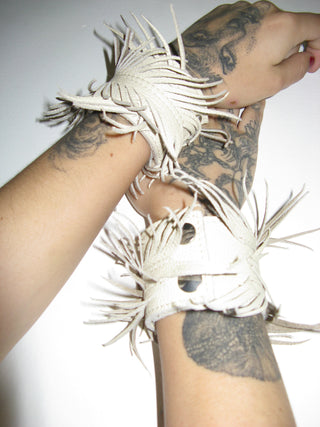 LEATHER FEATHER CUFFS